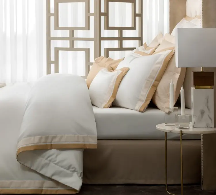 Elegant bedding set in white and champagne color