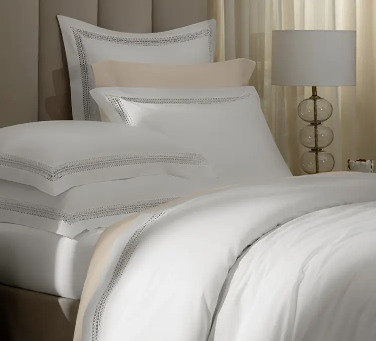 Breathable white pillowcase with natural texture and embroidery